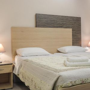Delfini Beach Hotel&Suites